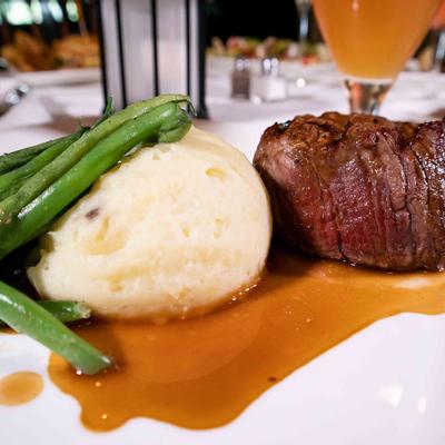 Grilled meat and mashed potato