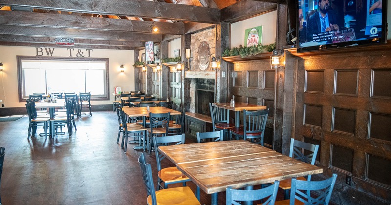 Interior, tables and chairs, fireplace, TVs