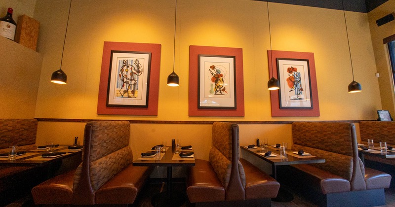 Interior featuring booths and wall art