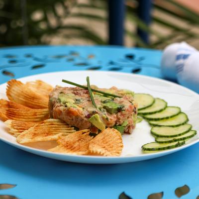 Salmon Tartare, avocado, onion, cilantro, lime juice , chips