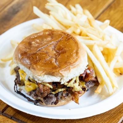 All The Way Smash burger served with fries.