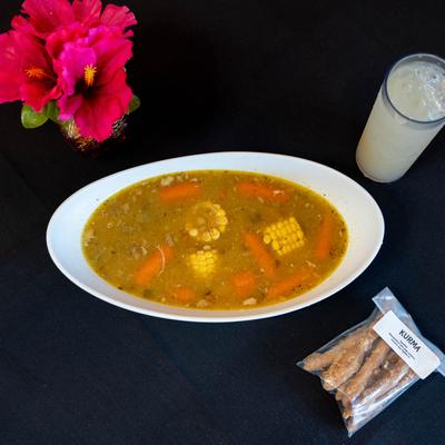 Chicken soup, with carrots, and corn on the cob.