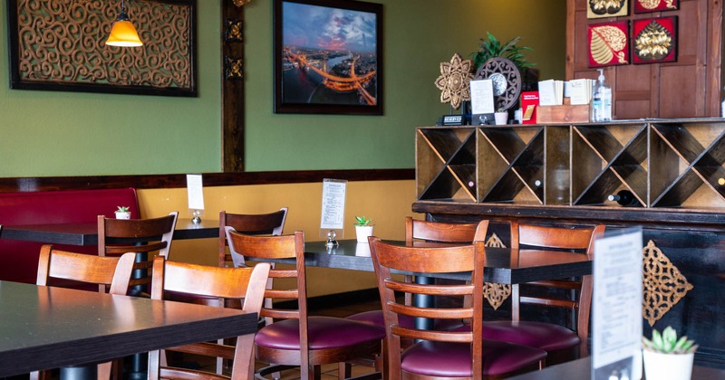 Interior, tables and chairs ready for guests
