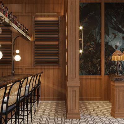 Wood paneled bar area with a counter and stools.