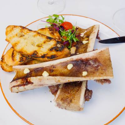 Roasted bone marrow with truffle aioli, served with toasted  bread.