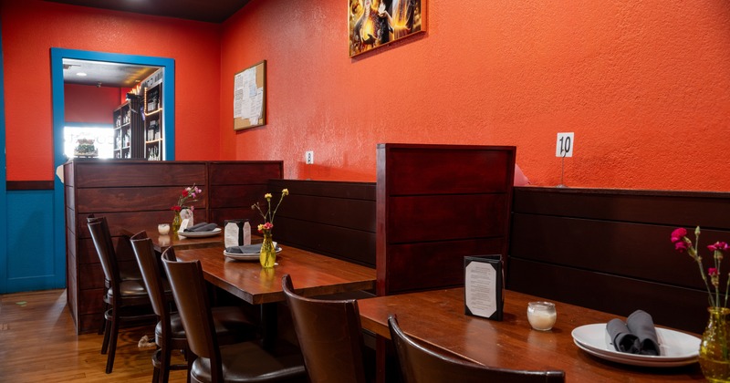 Interior, dining area, wooden benches, tables and chairs