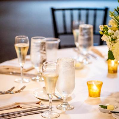 A table set for dining with lit candles.