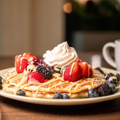 Pancakes topped with berries.