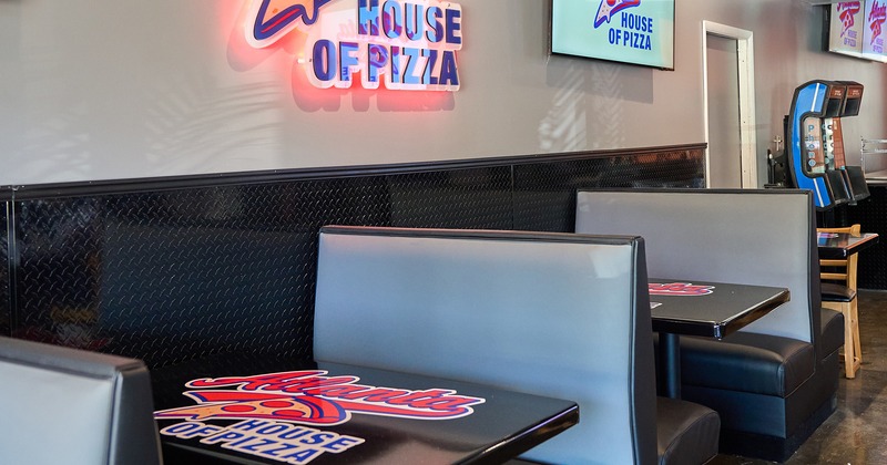Interior space, upholstered booths lined up along the wall
