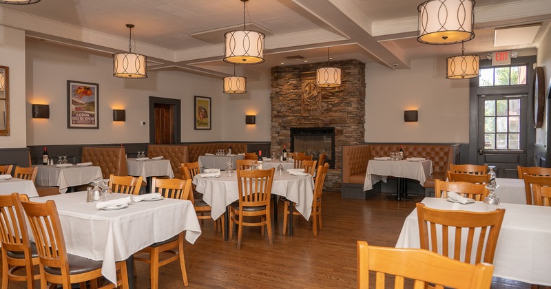 Elegant and spacious dining area with set dining tables