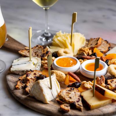 Sampler plate with pastries, cheese and dried fruit