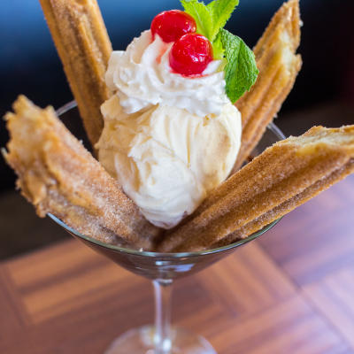 Served churros dessert.