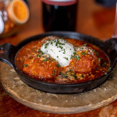 Meatballs, in marinara sauce and fresh ricotta cheese