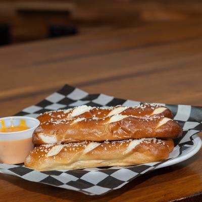 Pretzels served with beer cheese for dipping.
