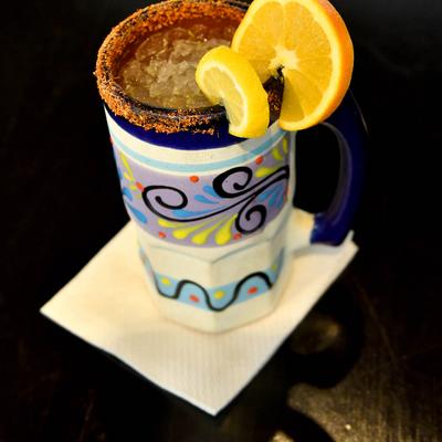 Cocktail with a rimmed cup.