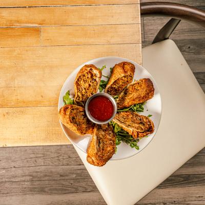 Egg Rolls and chile sauce.