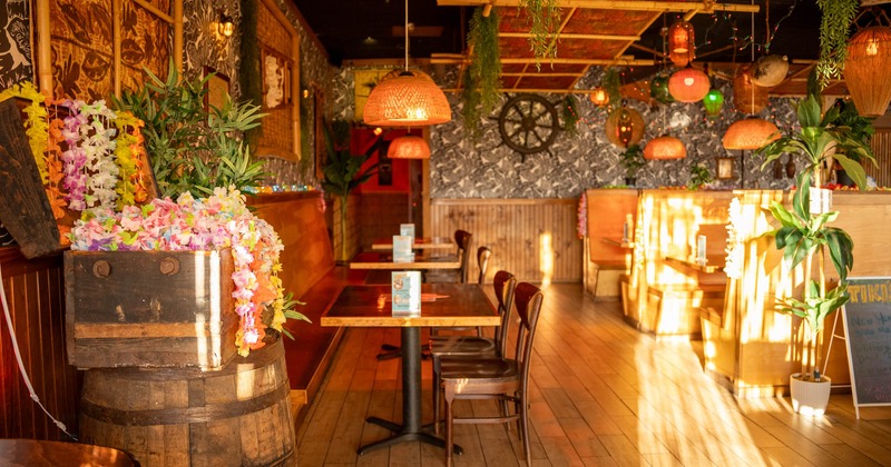 Seating area, tables with chairs and restaurant booths