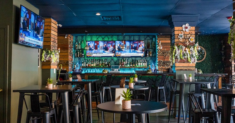 Interior seating area, tall tables and bar stools