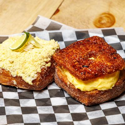 Creme Brulee Croissant Donuts alongside Key Lime Pie Croissant Donuts.