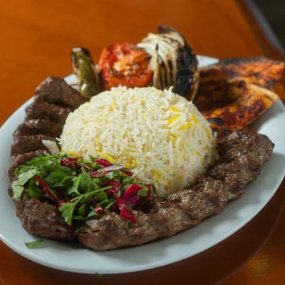 Chicken Kabob with rice and grilled vegetables.