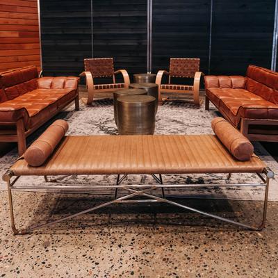 Leather sofas, chairs, and accent tables.