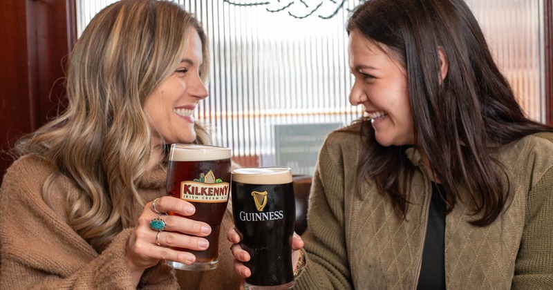 Customers toasting with beers