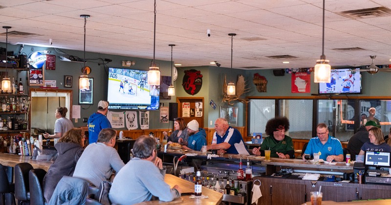 Customers eating and drinking