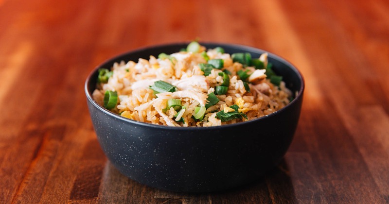 Fried rice, with scallions, eggs, ginger, soy sauce, and pulled chicken
