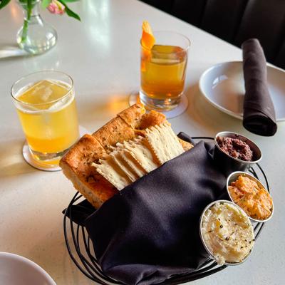 Pastry and crackers served with sauces and cocktail drinks
