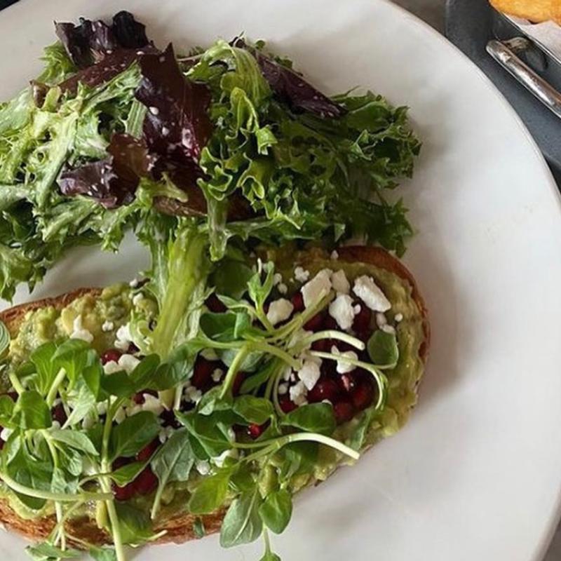Avocado toast, Pomegranate Seeds and Feta Cheese photo