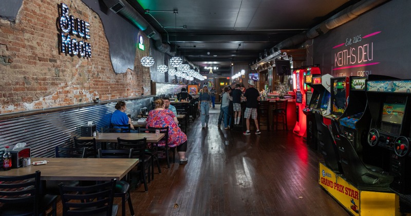 Interior, seating space with arcade games