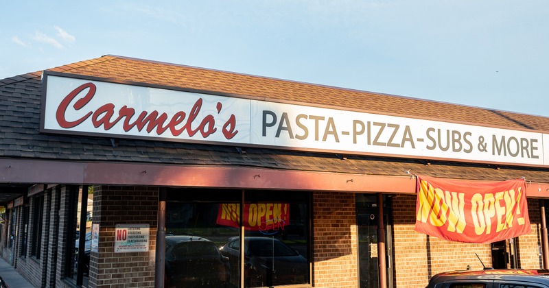 Exterior, front view, entrance, sign above