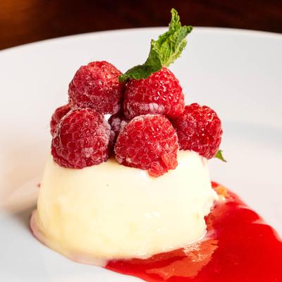 White Chocolate Cheesecake with Raspberry Coulis.