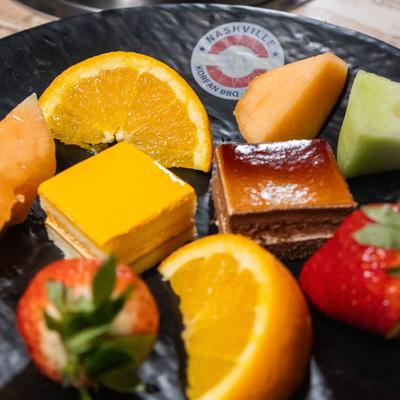 Fresh fruit and cake.