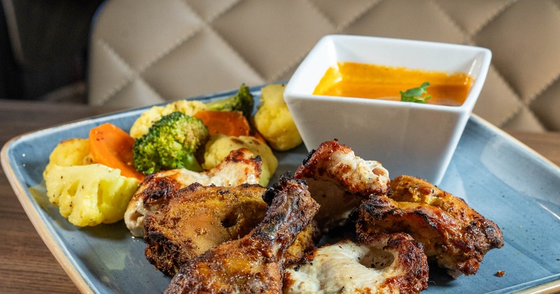 Tandori chicken with sides