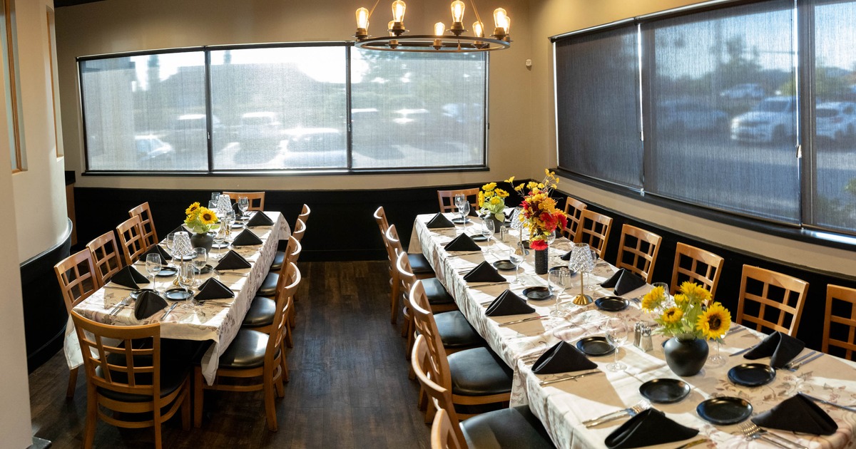 Dining tables for multiple people ready for guests