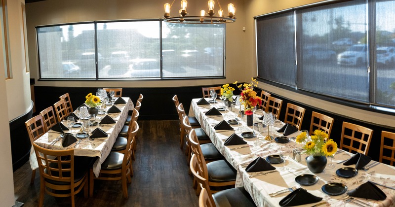 Dining tables for multiple people ready for guests