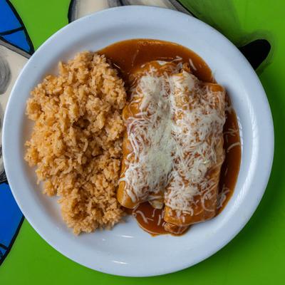 Cheese-covered enchiladas with red sauce and rice.