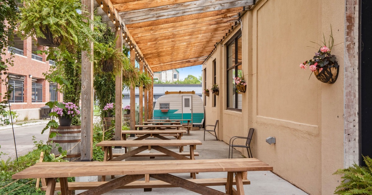 Outdoor covered patio with picnic tables