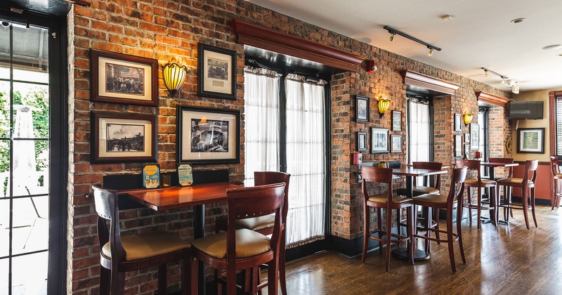 Interior space, seating area with high tables and stools