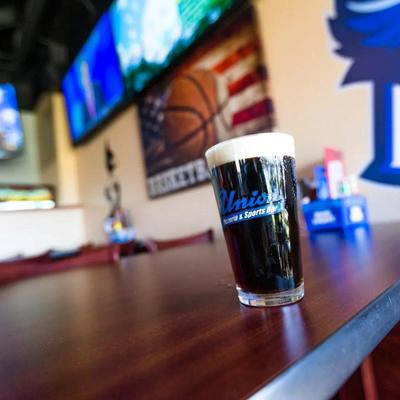 A glass of stout beer.