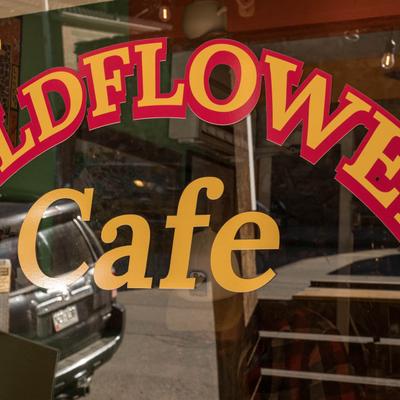 The restaurant's name on the window.