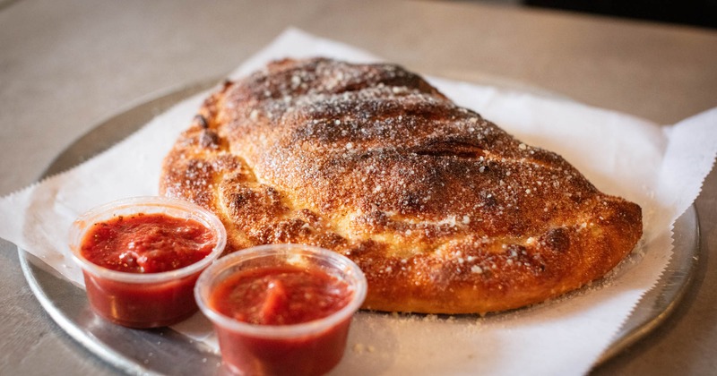 Calzone with marinara sauce