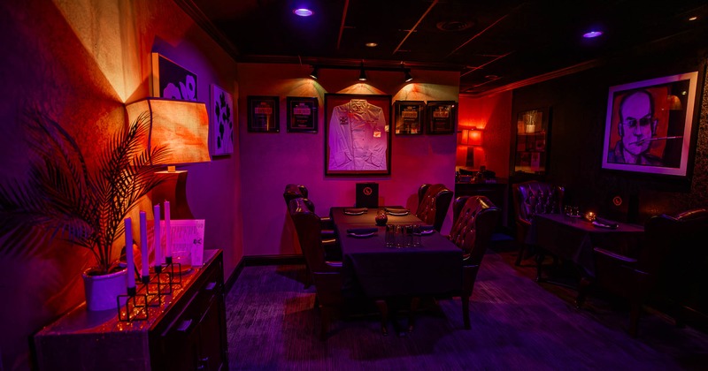 Interior, table for four with massive leather chairs