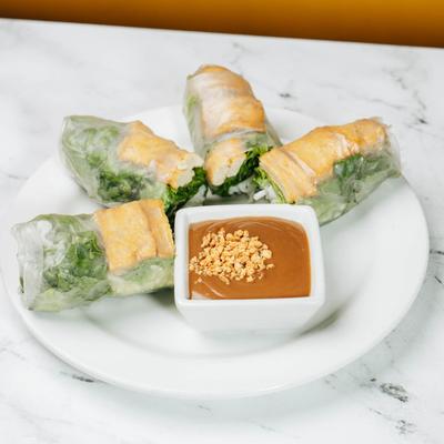 Vegan Fresh Rolls served with peanut dipping sauce.