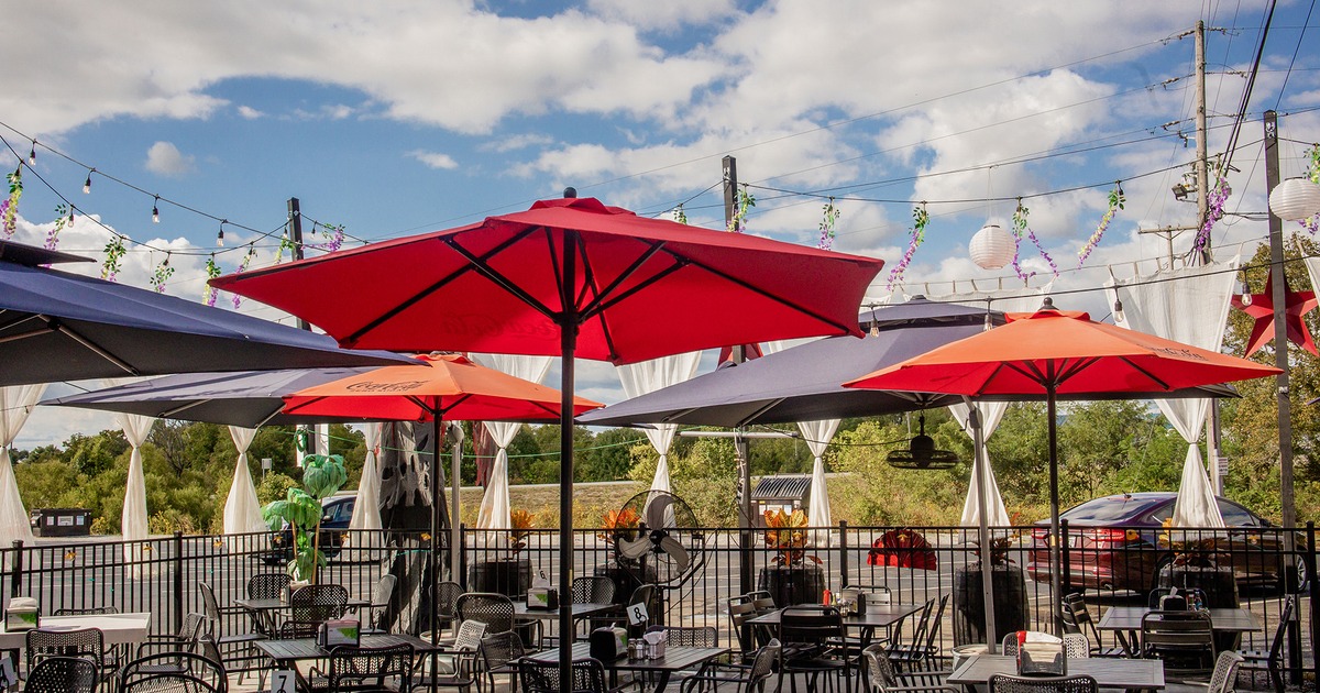 Outdoor seating area, tables, chairs, parasols