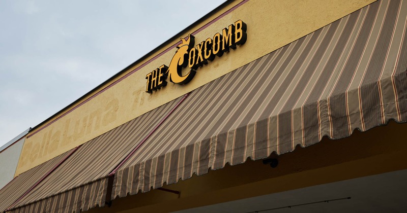 Exterior, sign above the awning