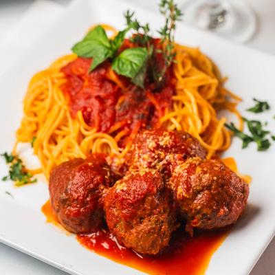 Spaghetti with Meatballs, served in tomato sauce.