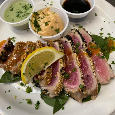 Fresh local Sesame Seared Tuna with wasabi, soy sauce and ramoulade..