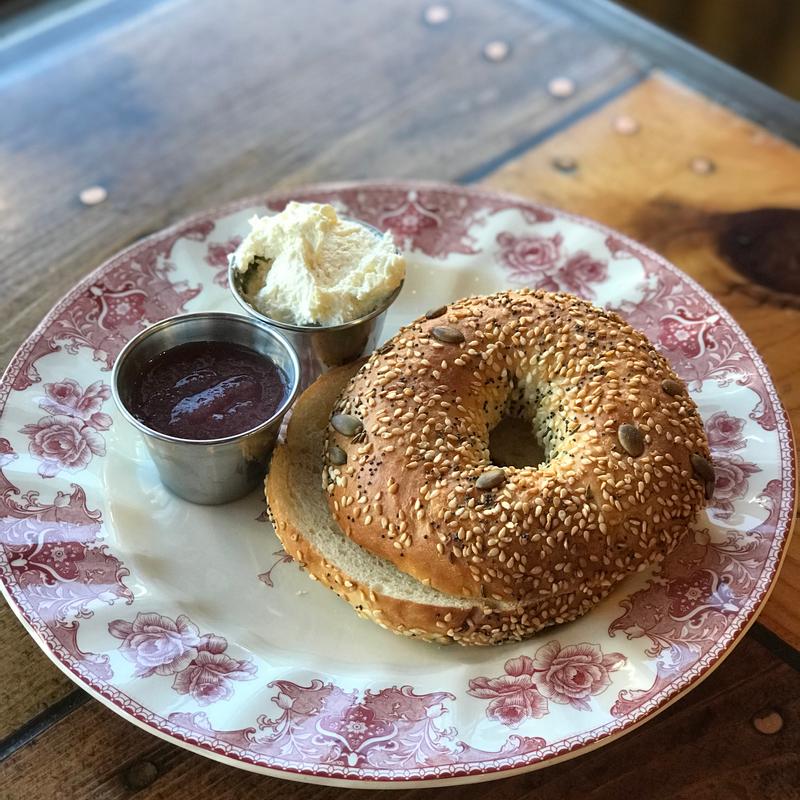 Seeded Bagel with Cream Cheese and Jam photo